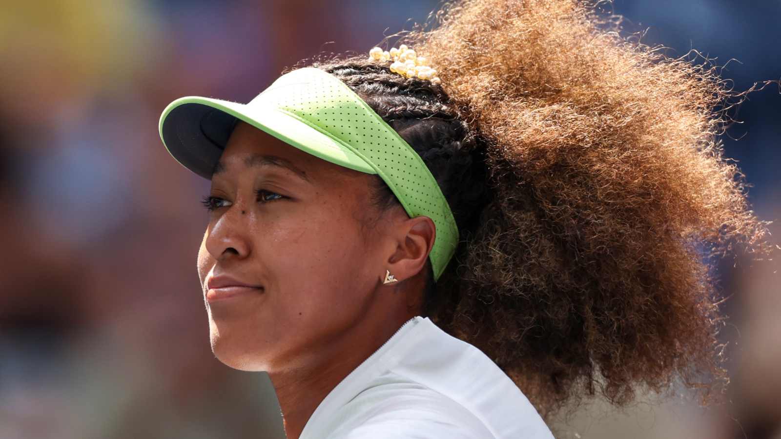 Naomi Osaka says she sees herself as a friend rather than a famous person while walking in a city